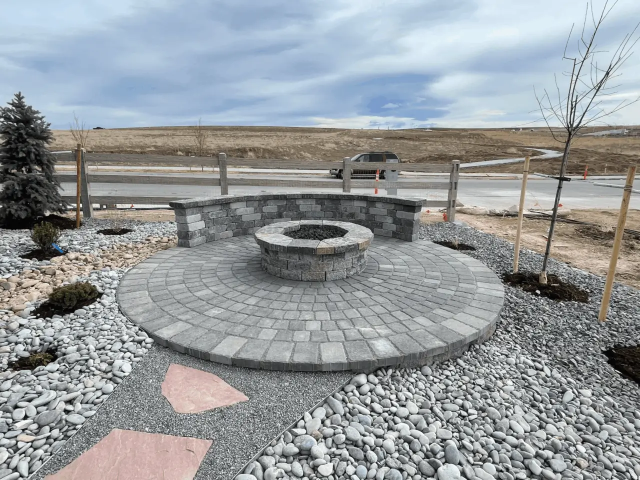 Omni Landscape and Sprinkler - Paver Circle Patio and Gas Fire Pit with Flagstone Steppers