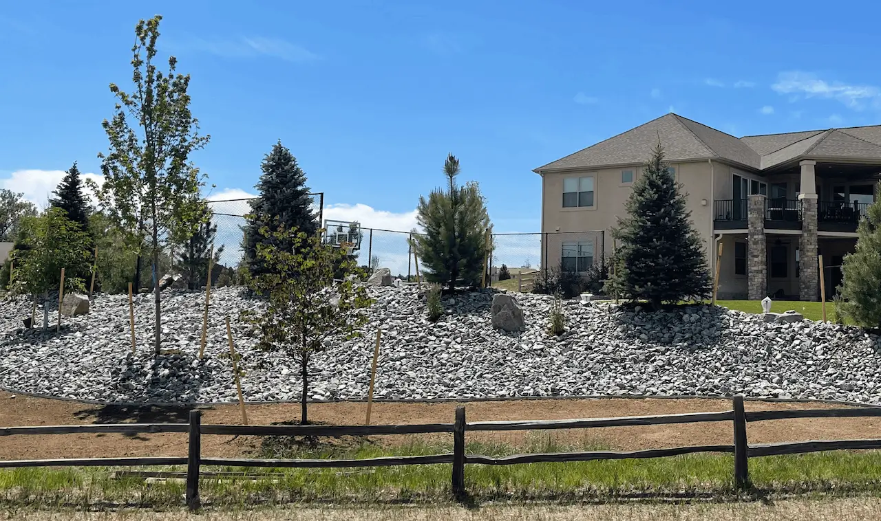 Omni Landscape and Sprinkler - Paver Patio - Berm -Trees